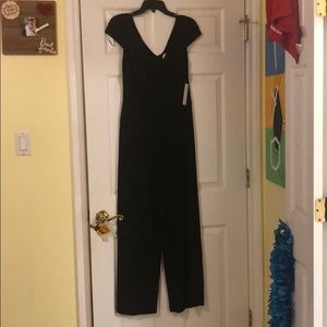 Black jumpsuit with laced embellished sleeves